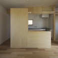壁付けキッチンと造作家具のカップボード