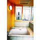 十和田石とヒバ材による最上階の浴室